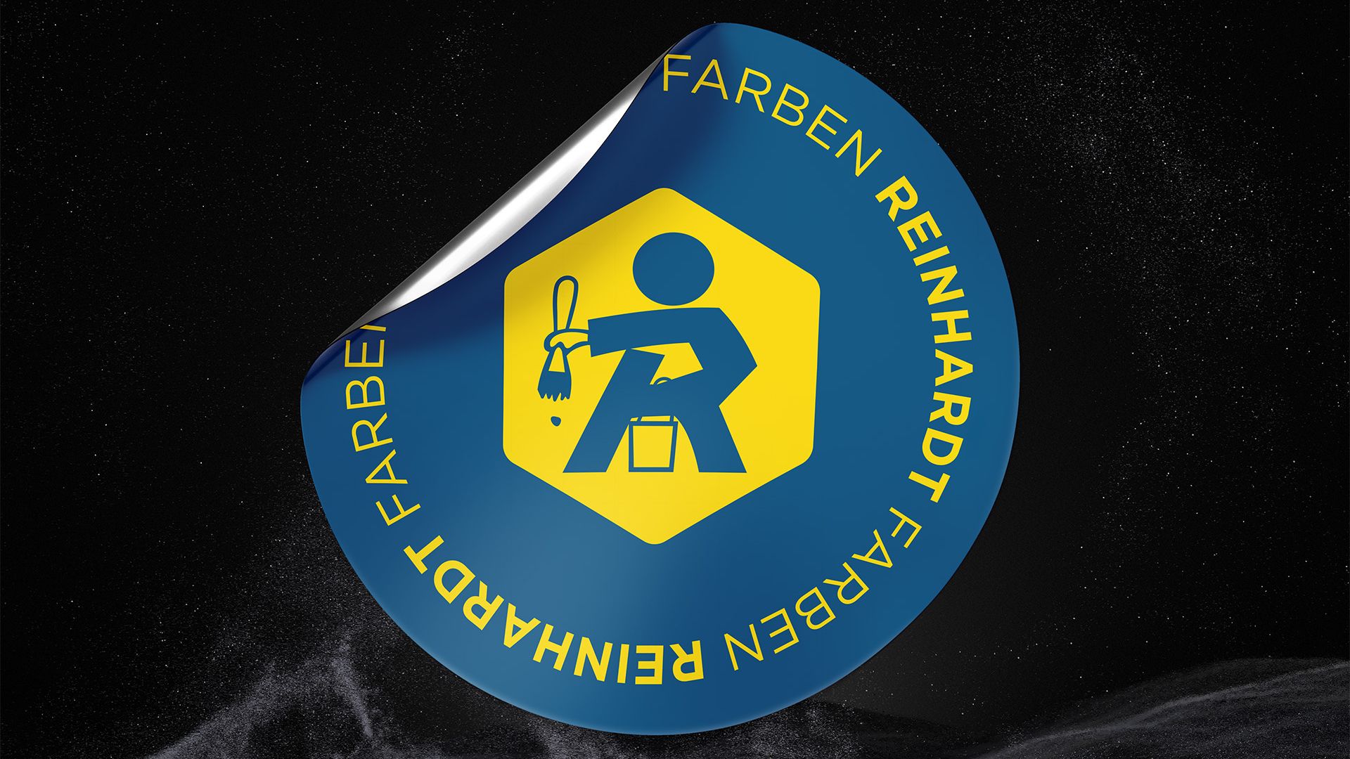 Ein Sticker des Logos auf schwarzem Hintergrund